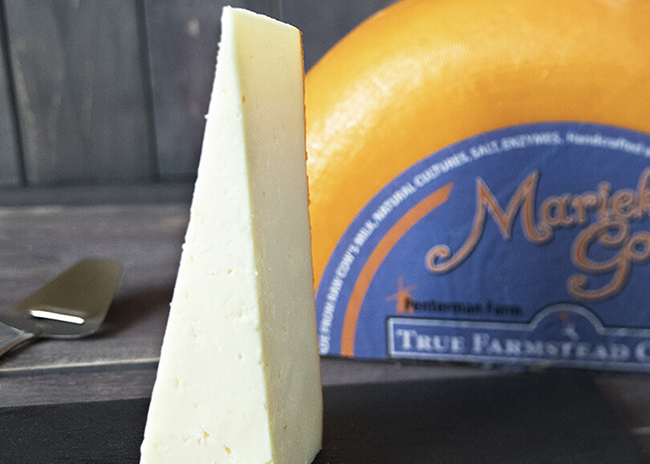 This is a picture of Marieke Smoked Gouda cheese, offered by Fromagination.