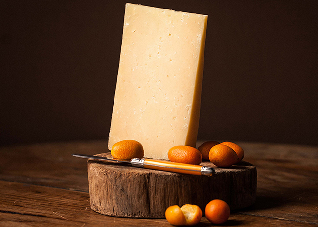 This is a picture of Sartori's BellaVitano Citrus Ginger cheese, offered by Fromagination.