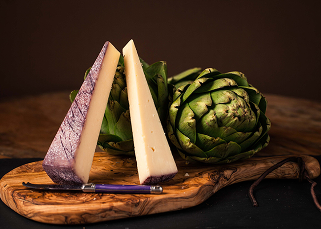 This is a picture of Sartori BellaVitano Merlot cheese, offered by Fromagination.