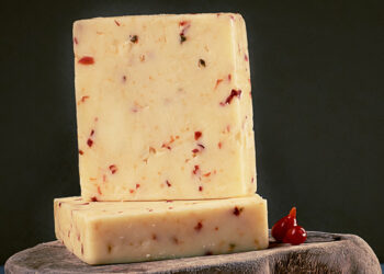 This is a picture of Chipotle Havarti cheese, offered by Fromagination.