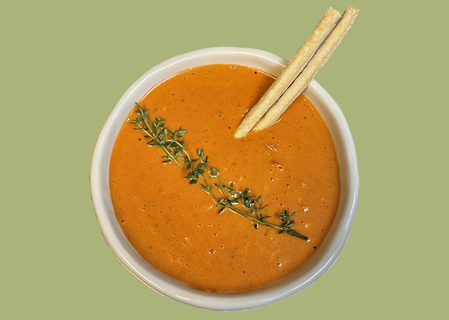 This is a picture of Fromagination's Red Pepper Bisque soup.