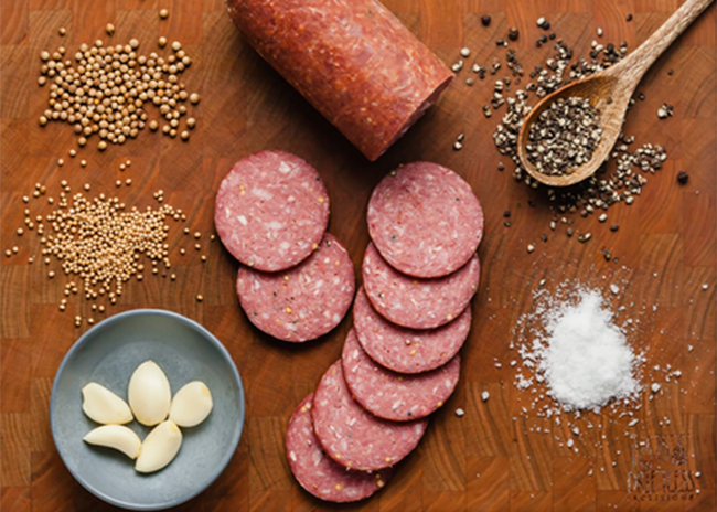 This is a picture of Driftless Provisions' Summer Sausage, offered by Fromagination.