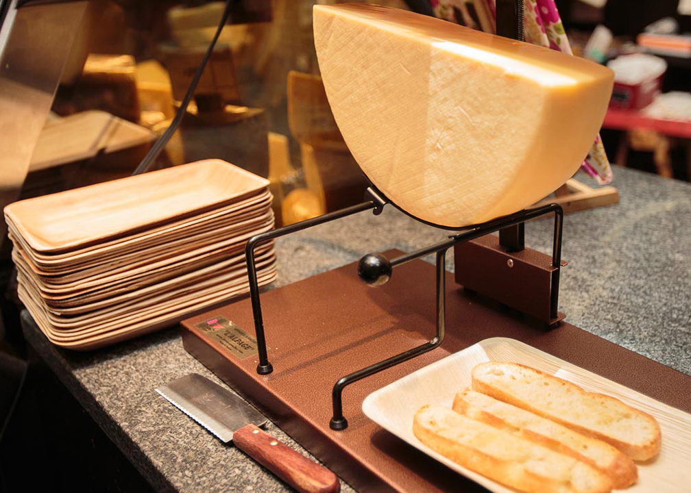 Fromagination serves Swiss Raclette hot meals during winter months.