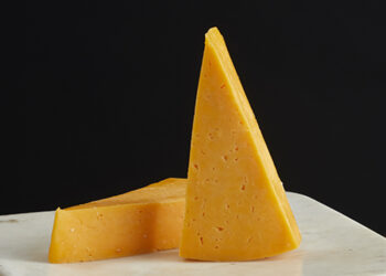 This is a picture of Deer Creek Cheese's The Robin, a traditional Colby cheese offered by Fromagination.