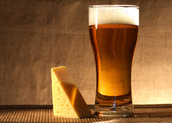 This is a picture of cheese and beer.
