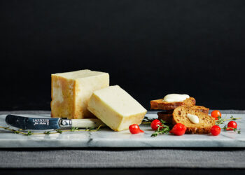 This is a picture of Limburger cheese, featured by Fromagination.