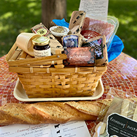 This is a picture of a Fromagination picnic basket