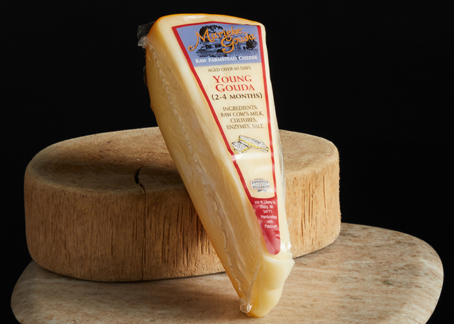 This is a picture of Marieke Young Gouda cheese, offered by Fromagination.