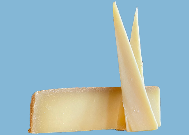 This is a picture of L'Etivaz AOP Swiss Gruyere cheese, offered by Fromagination.