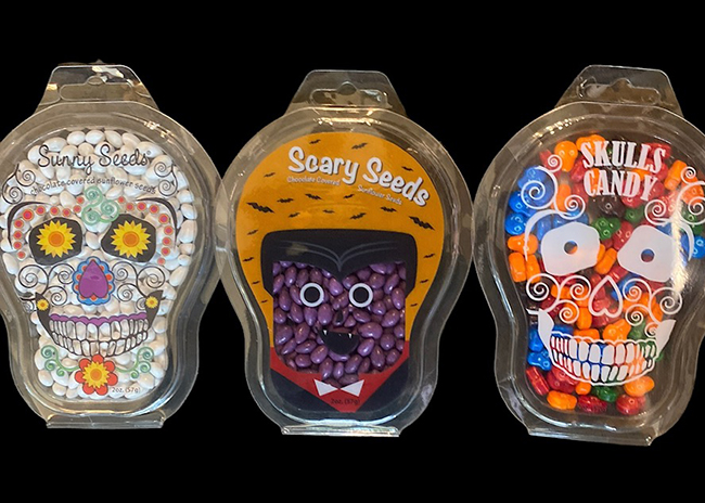 This is a picture of Halloween Skull Sunflower Seeds and Candy, offered by Fromagination.