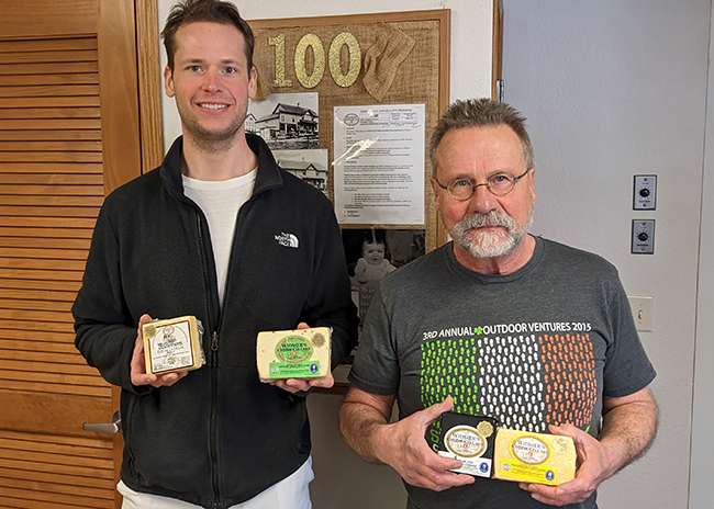 This is a picture of Joey and Joe Widmer at the Widmer's Cheese factory in Theresa, Wisconsin.