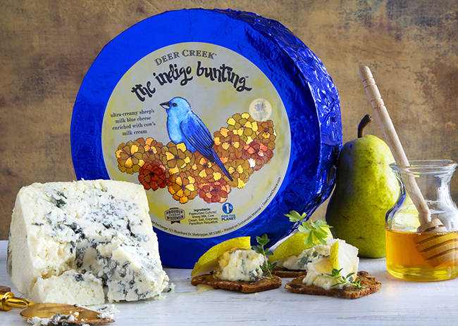 This is a picture of Deer Creek's Indigo Bunting Blue cheese, offered by Fromagination.