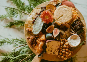 This is a picture of a holiday cheese board, offered by Fromagination.