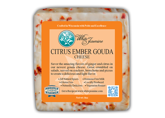This is a picture of White Jasmine Citrus Ember Gouda cheese, offered by Fromagination.