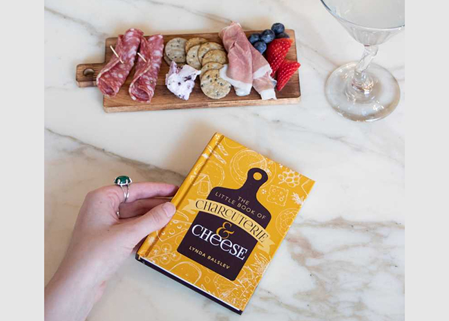This is a picture of the Little Book of Charcuterie and Cheese, offered by Fromagination.