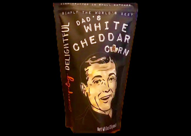 This is a picture of Simply Delightful Dad's White Cheddar Corn, offered by Fromagination.